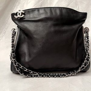 Chanel black soft leather shoulder bag. Beautiful condition. Silver chain strap.